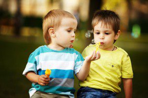 Children with ASD blowing bubbles